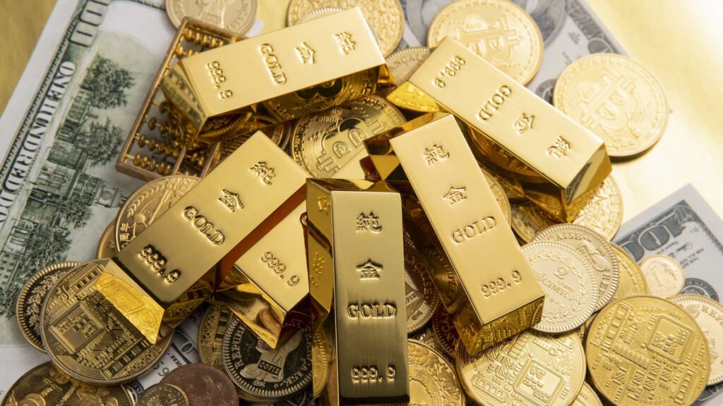 Цена на золото немного растет на фоне удешевления доллара