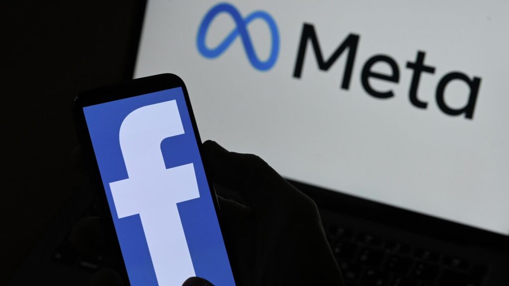 Логотип Facebook на фоне логотипа Meta