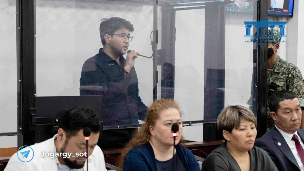 Куандык Бишимбаев говорит в микрофон на апелляционном суде